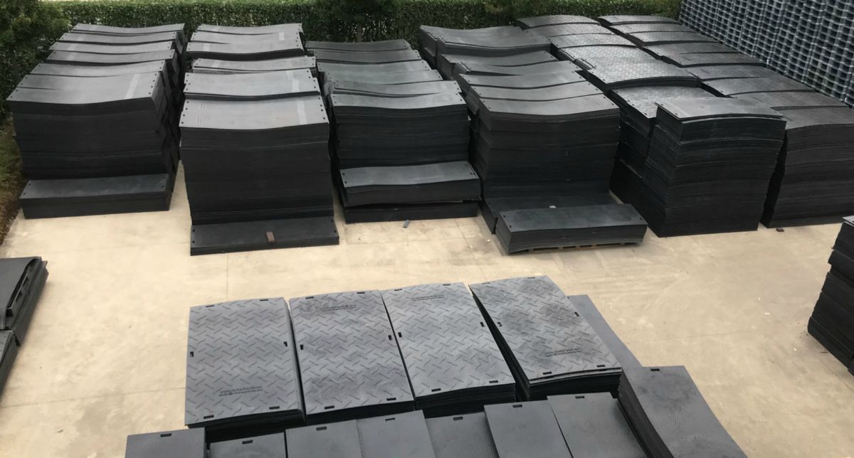 Stock of ground protection mats in warehouse